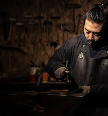 Craft designer working on a ring