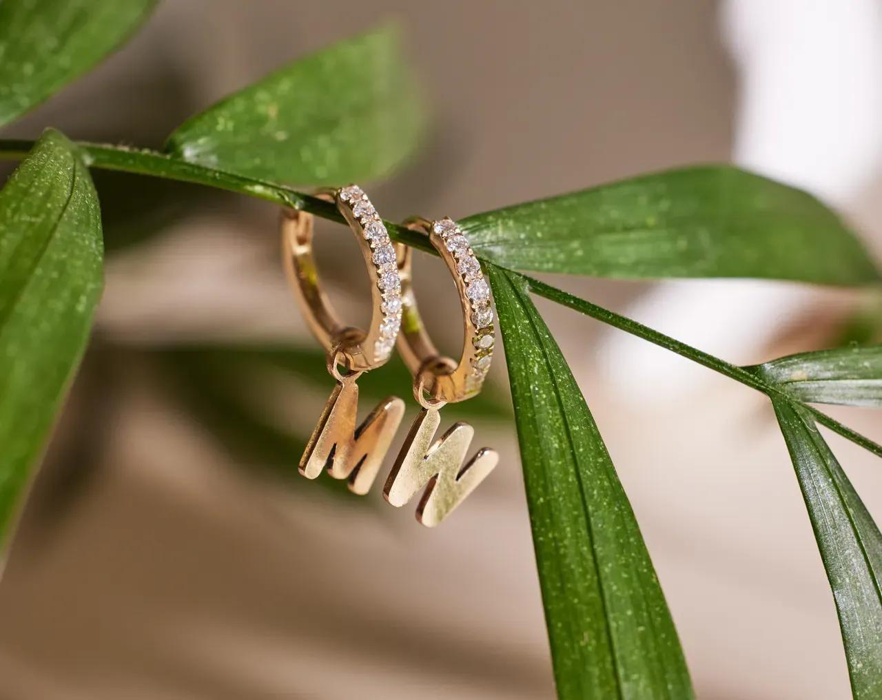 Michelle Wie West's custom initial huggies earrings