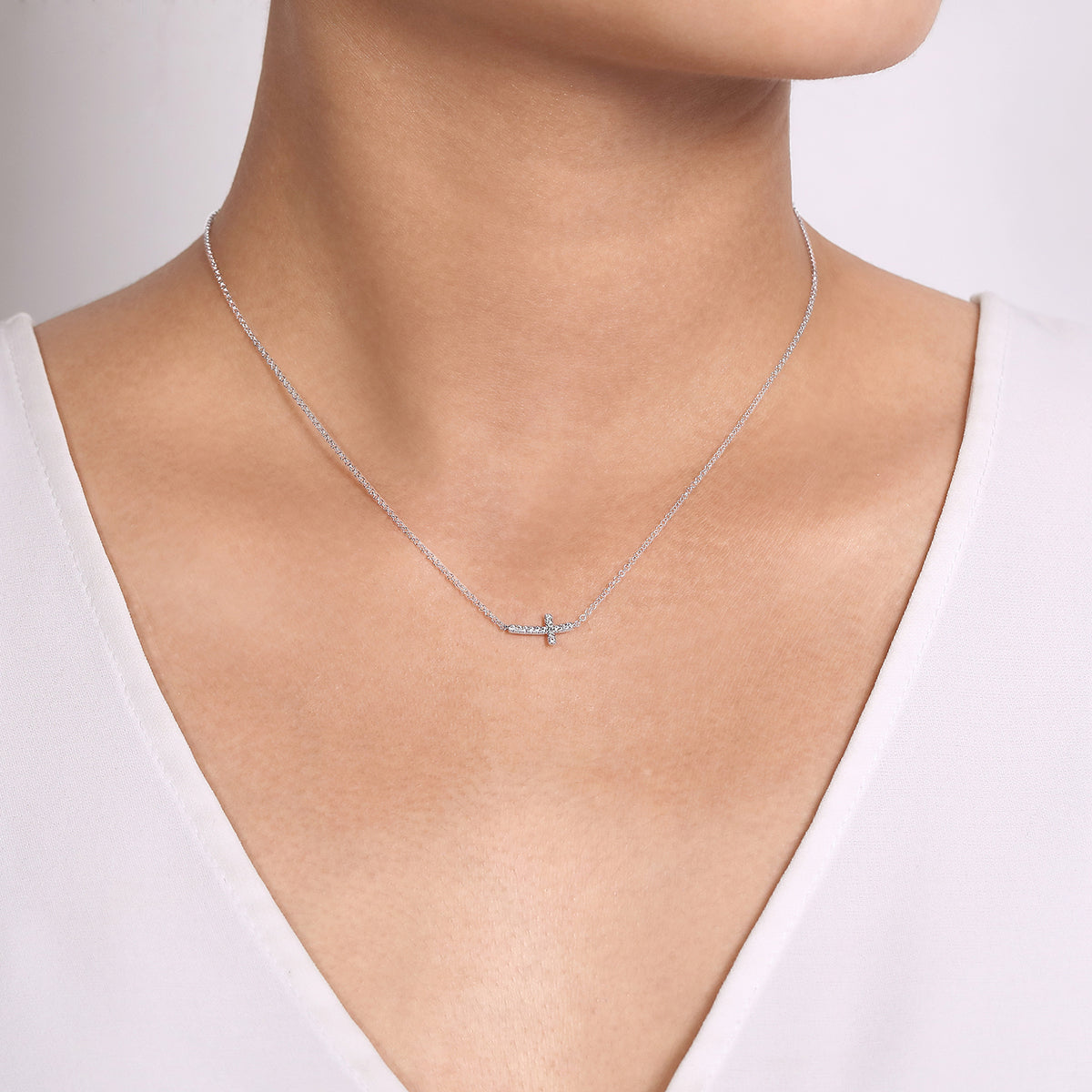 14K White Gold Sideways Curved Diamond Cross Necklace - View 3