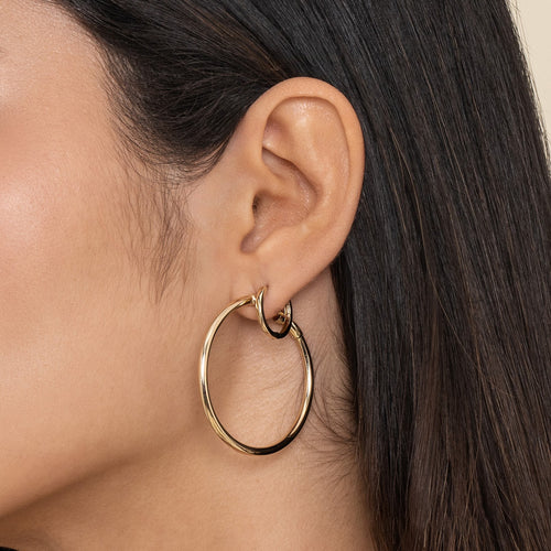Boucles d'oreilles mini-créoles en or jaune 14 carats