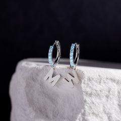 Custom Initial Blue Topaz Huggies thumbnail 9