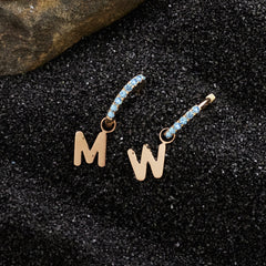 Custom Initial Blue Topaz Huggies thumbnail 2