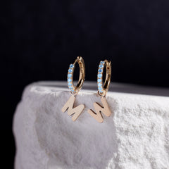 Custom Initial Blue Topaz Huggies thumbnail 3